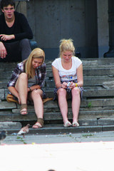 Two sitting girls upskirts